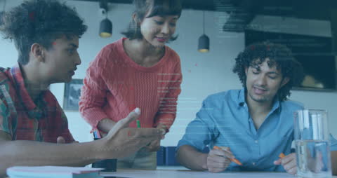 Diverse Team Analyzing Data in Innovative Workspace