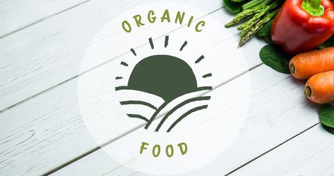 Organic food logo with fresh vegetables on rustic surface