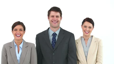 Happy Business Team Smiling in Professional Attire