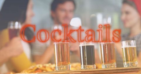 Friends Enjoy Diverse Cocktails at Bar Celebration