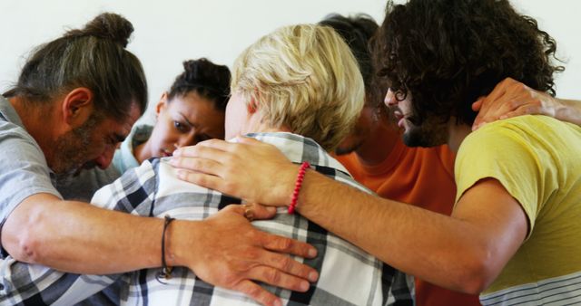 Diverse Support Group Embracing in Emotional Circle - Download Free Stock Images Pikwizard.com