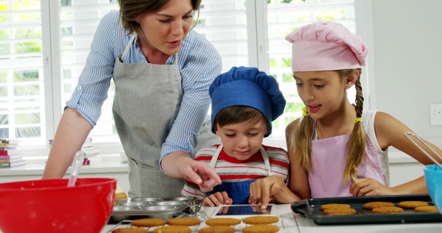 Mother Teaching Children Baking Lesson in Kitchen - Download Free Stock Images Pikwizard.com