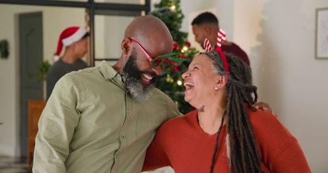 Diverse Family Celebrating Christmas with Laughter and Joy