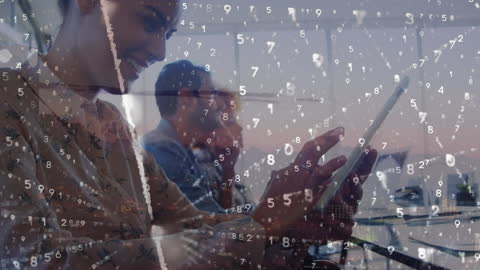 Diverse Business Team Engaging in Digital Data Analysis