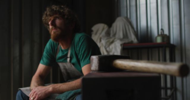 Bearded Metal Worker Taking Break in Workshop - Download Free Stock Images Pikwizard.com