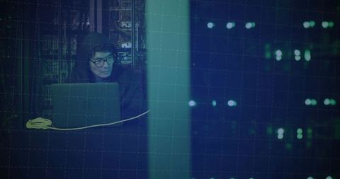 Hooded Technician Managing Network in Data Center Environment