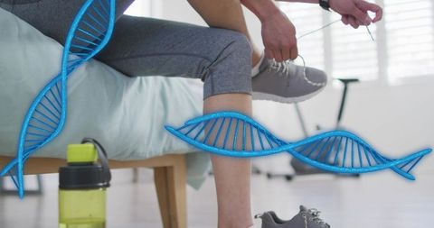 Korean woman tying sneaker on bed edge with blue dna helix overlay preparing for workout