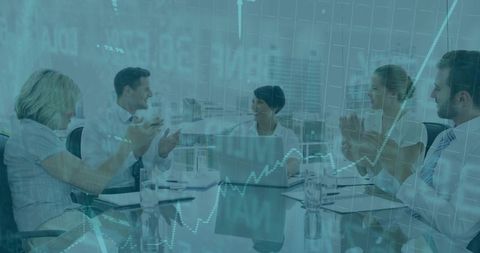 Successful business team meeting in modern boardroom with charts