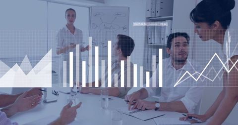 Business Team Engaging in Data-Driven Meeting With Graph Overlays