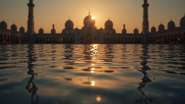 Majestic Mosque Reflections at Tranquil Sunset