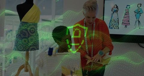 Fashion designers collaborating in trendy studio environment