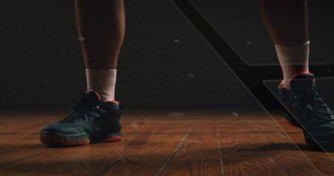 Modern Athletic Footwear on Gym Floor with High-Tech Overlay