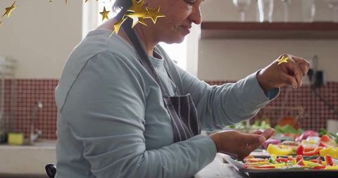 Senior Woman Cooking Vegetables with Joy in Home Kitchen
