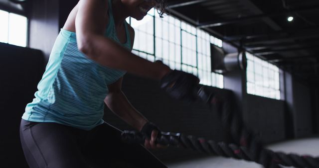 Fit Woman Working Out With Battle Ropes in Gym - Download Free Stock Images Pikwizard.com