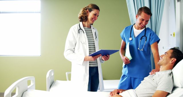 Doctor and Nurse Consulting with Patient in Hospital - Download Free Stock Images Pikwizard.com