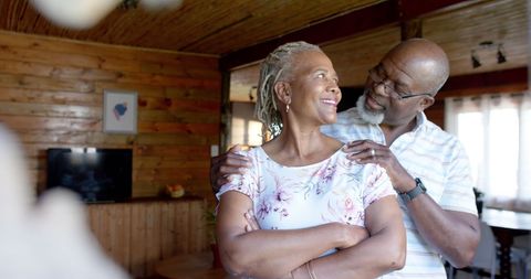 Senior African American Couple Embracing in Cozy Living Space - Download Free Stock Images Pikwizard.com