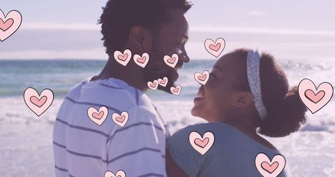 Dreamy Romantic African American Couple on Beach with Heart Graphics - Download Free Stock Images Pikwizard.com