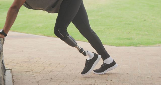 Athlete with Prosthetic Leg Engaging in Outdoor Exercise - Download Free Stock Images Pikwizard.com