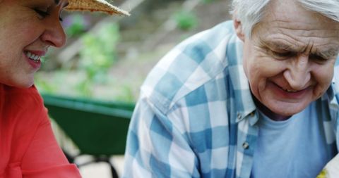 Senior Couple Enjoying Time Together Outdoors Smiling and Bonding