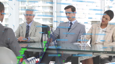 Diverse Business Team Analyzing Data with Financial Graphs Overlay