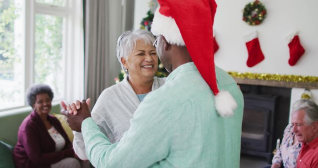 Happy Senior Couple Dancing During Christmas Celebration - Download Free Stock Images Pikwizard.com