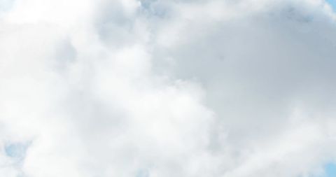 Fluffy White Clouds Floating in Bright Blue Sky on Sunny Day - Download Free Stock Images Pikwizard.com