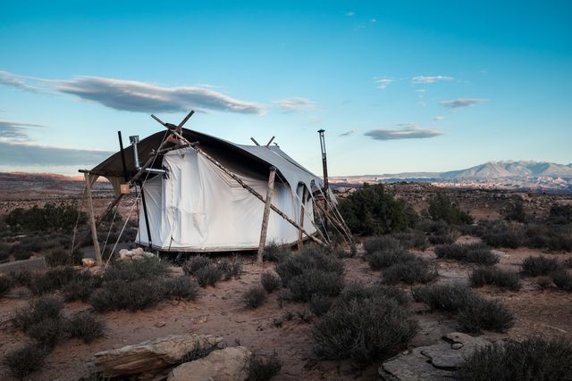Rustic Canvas Tent in Arid Desert Landscape - Download Free Stock Photos Pikwizard.com