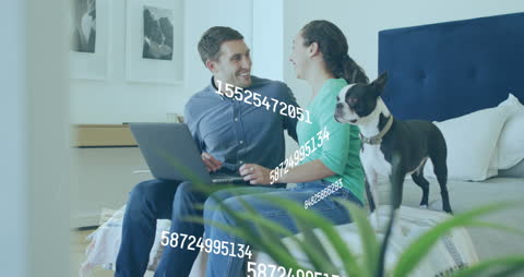 Couple with Laptop Surrounded by Floating Numbers, Digital Concept
