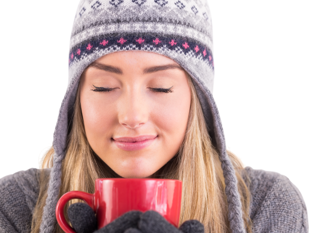 Blonde Woman in Winter Clothes Holding Mug Transparent Background - Download Free Stock Videos Pikwizard.com