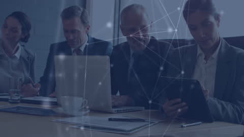 Business Team Collaborating with Technology and Networking Connections