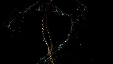 Dynamic Splash of Water in Dark Ambiance