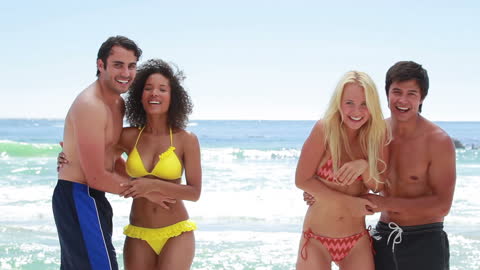 Friends Enjoying a Playful Day at the Beach