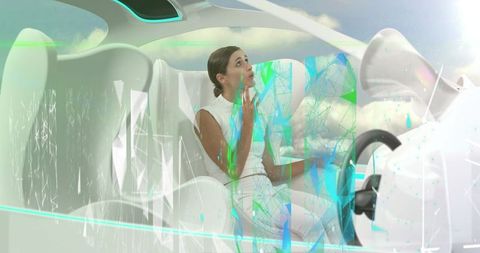Woman navigating data visualizations in self-driving car