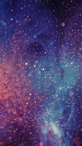 Vertical cosmic nebula transitioning into shimmering particle field for mobile portrait