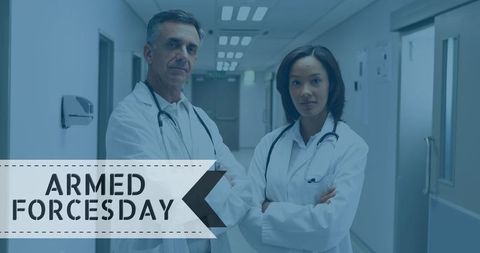 Doctors Standing in Hospital Corridor Supporting Armed Forces