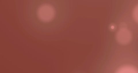 Ambient pink light orbs on soft blurred background