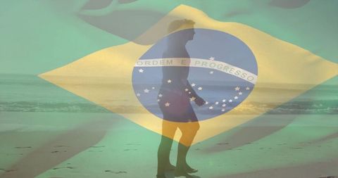 Silhouette of Surfer Walking on Beach with Brazilian Theme