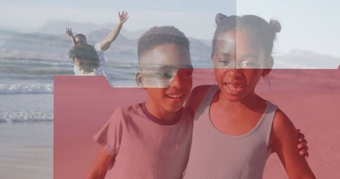 Joyful Siblings Hugging on Sunny Beach Day