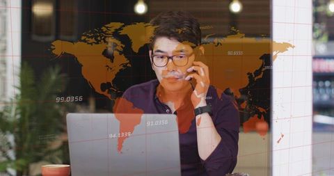 Professional Man Balancing Work with Smartphone and Laptop at Cafe