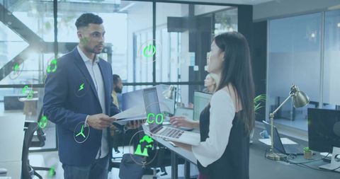 Diverse Professionals Discussing Green Energy Concepts