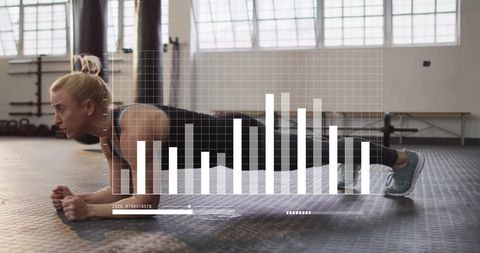 Female Athlete in Gym Planking with Digital Data Interface Overlay