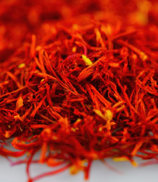 Close up of stack of saffron created using generative ai technology. Nature, seasoning and flavour concept, digitally generated image.
