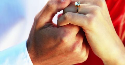 Engaged Couple Holding Hands with Gold Ring - Download Free Stock Images Pikwizard.com
