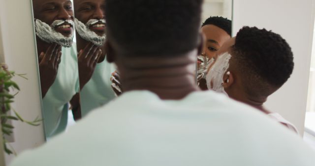 Father Teaching Son How to Shave in Bathroom Mirror - Download Free Stock Images Pikwizard.com