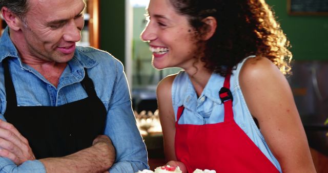 Happy Cafe Workers Smiling while Working Together - Download Free Stock Images Pikwizard.com