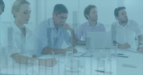 Business Team Analyzing Financial Data in Office Meeting