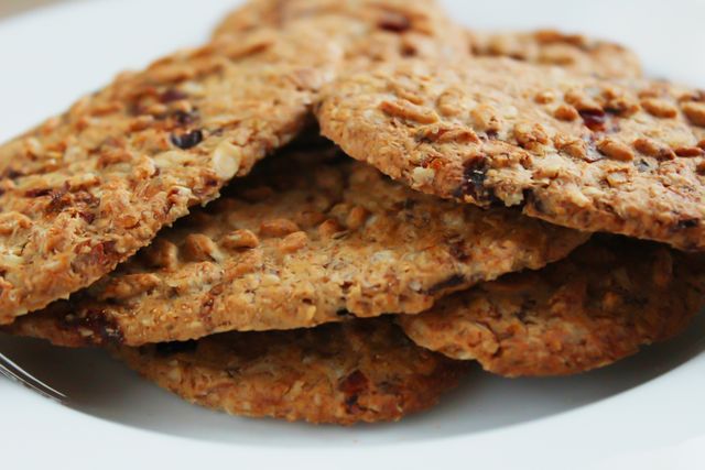 Fresh Baked Oatmeal Cookies with Nuts on White Plate - Download Free Stock Photos Pikwizard.com