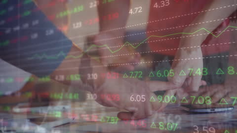 Business Team Analyzing Stock Market Data in Office Setting