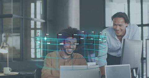 Team collaborating with holographic AR analytics on laptops in open modern office