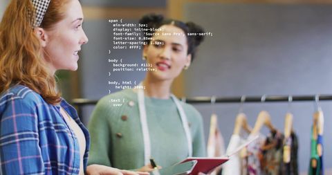 Creative office conversation and digital interface overlay